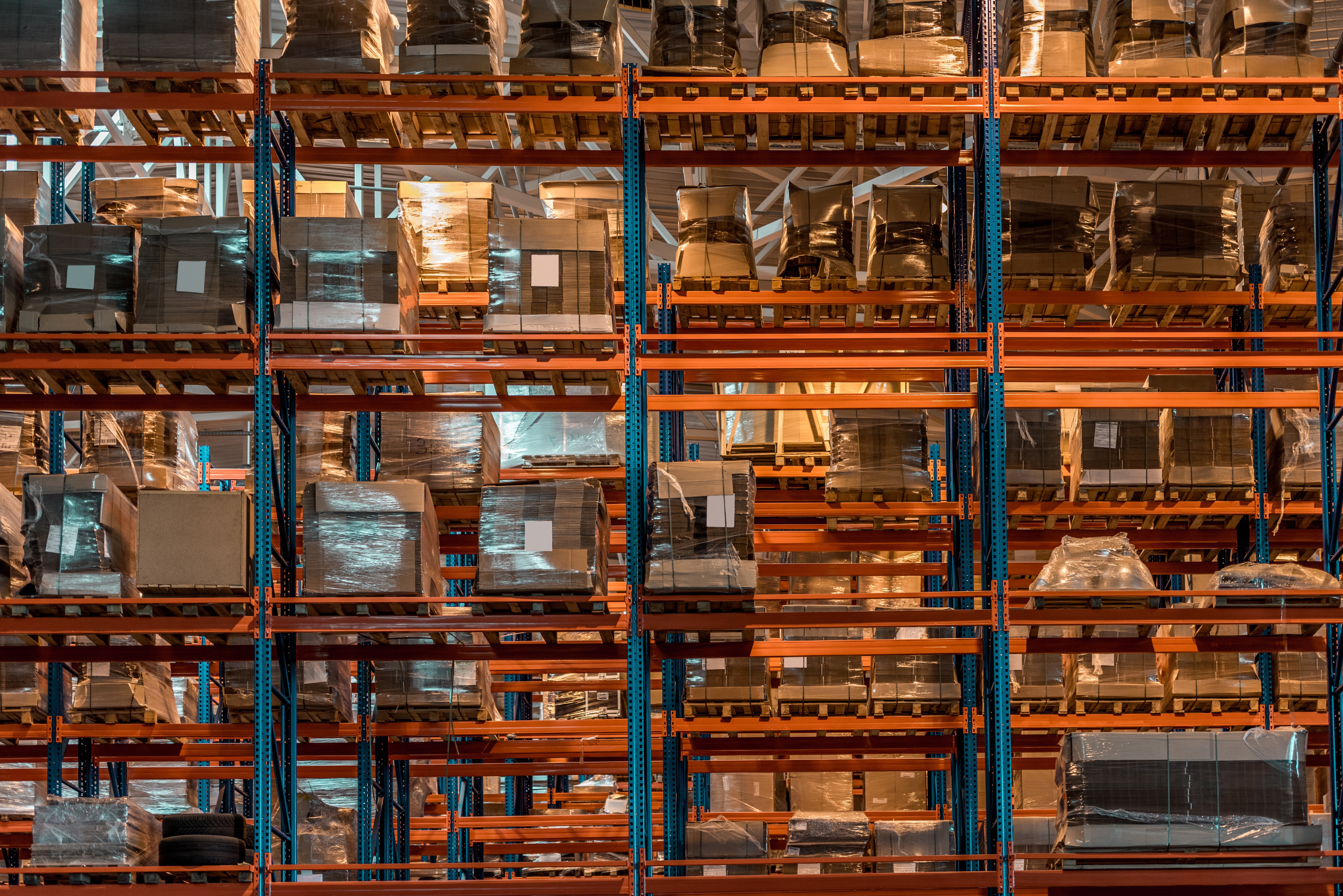 boxes-and-containers-on-shelves-in-modern-warehous-2022-12-16-18-33-32-utc