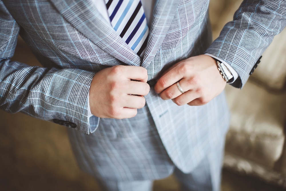 the-young-groom-in-the-wedding-day-he-is-buttonin-2022-12-24-00-39-46-utc-2